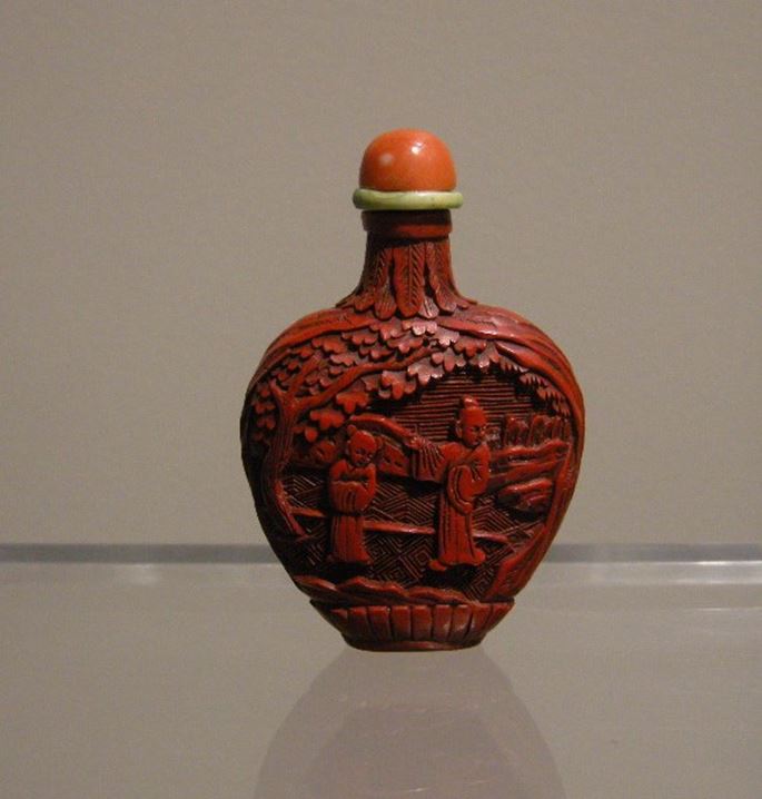 Snuff bottle cinabar lacquer sculpted with figures in a landscape | MasterArt